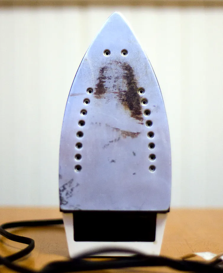 A burn pattern on an iron. It really looks more like Mary.