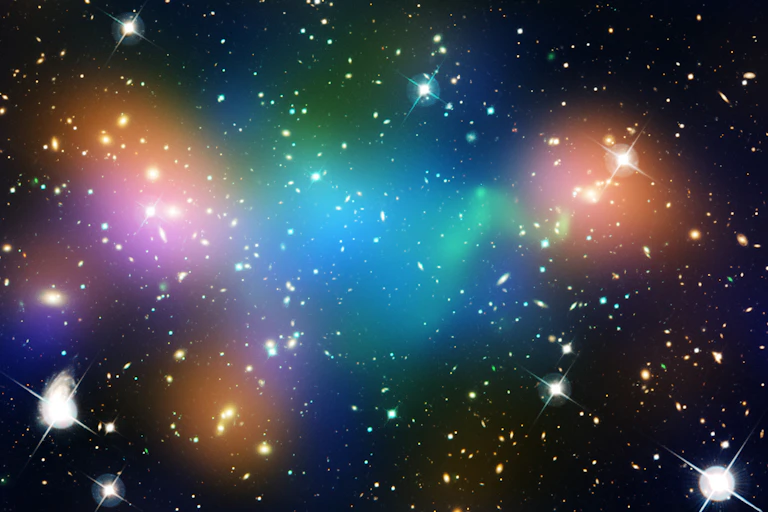 bright white stars against a dark background with overlays of pastel-coloured spots