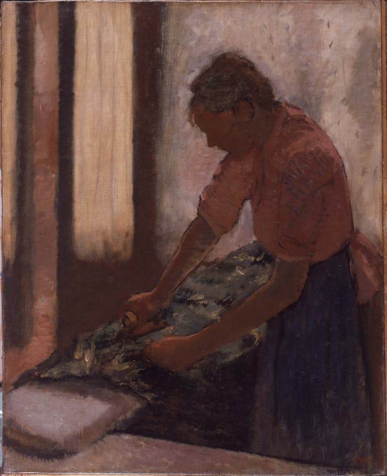 An Impressionist painting by Edgar Degas of a woman painting.