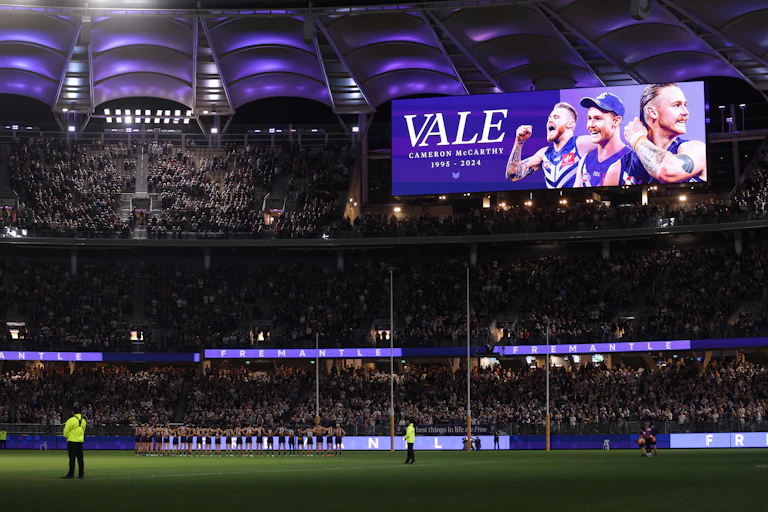 Players line up in tribute to former Fremantle and GWS player Cam McCarthy