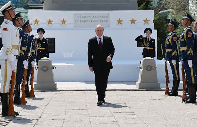 Vladmir Putin inspects an hoour guard during his visit to Beijing, May 2024.