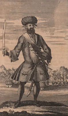 A historical etching of a pirate.