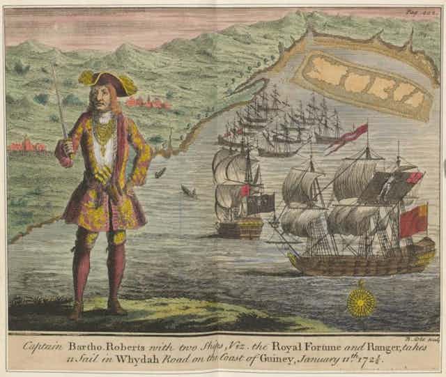 A historical coloured etching of a pirate and a fleet of ships.