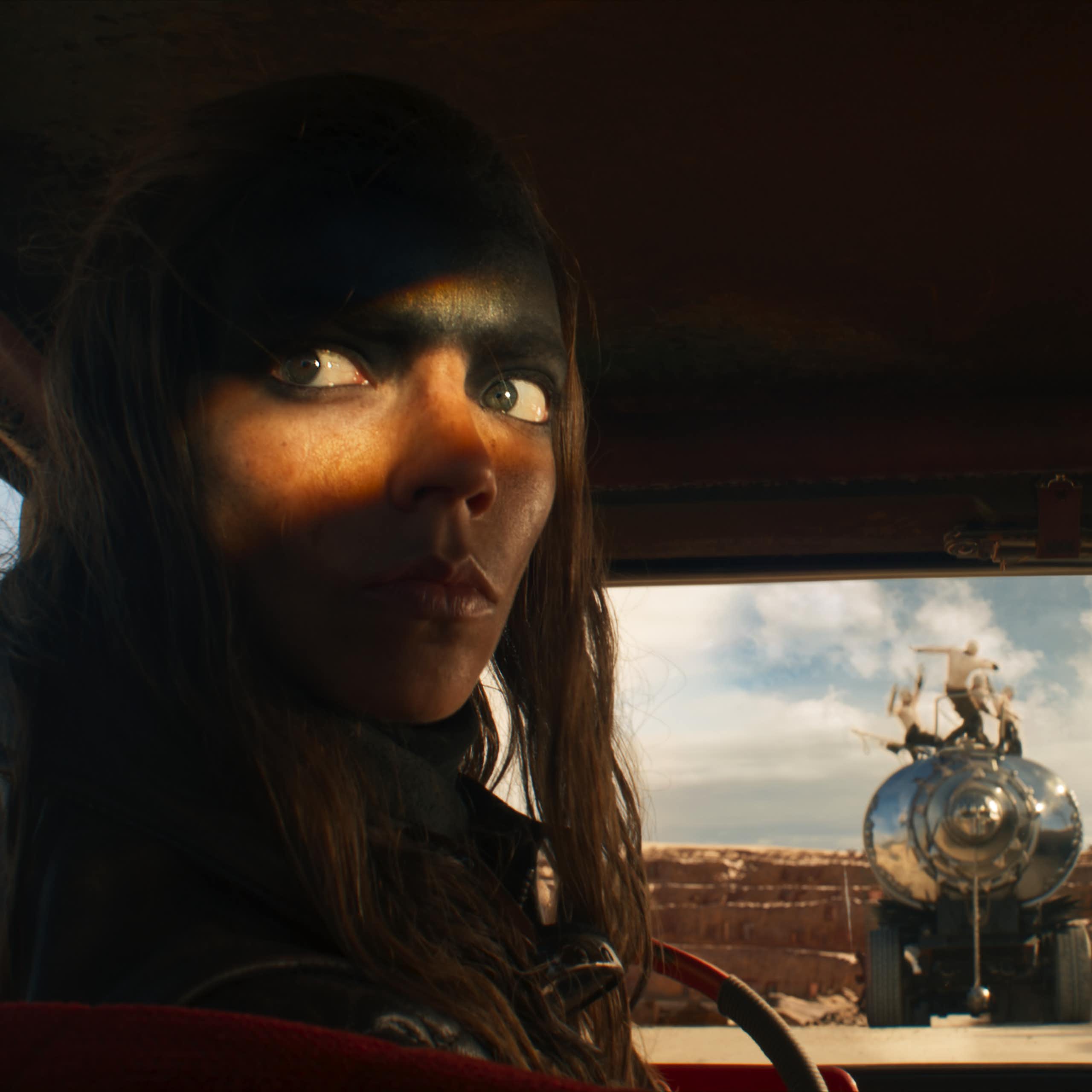 A still from the movie featuring lead actress in a truck cab.