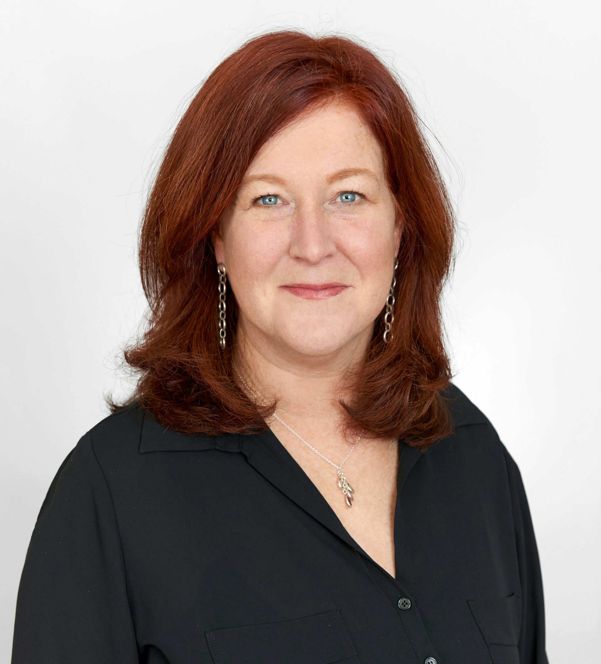 Smiling woman with red hair