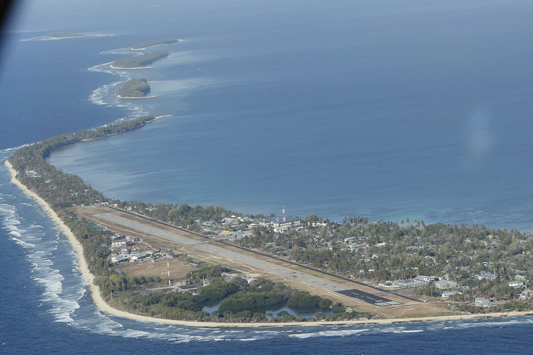 Aerial view of a settlement on a low-lying island