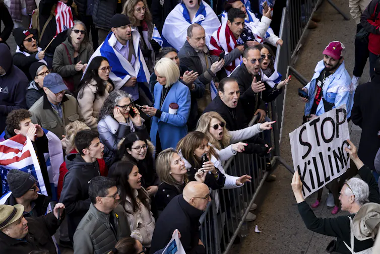 Protesters in New York yelling at one another.