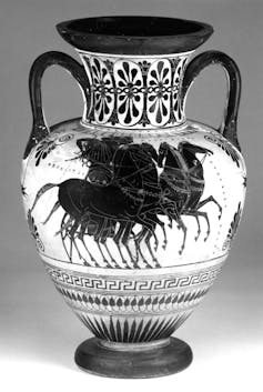 A black and white photo of an Ancient Greek jar showing Aphrodite riding a chariot.