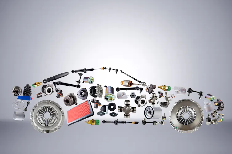 Illustration of car parts forming shape of a car.