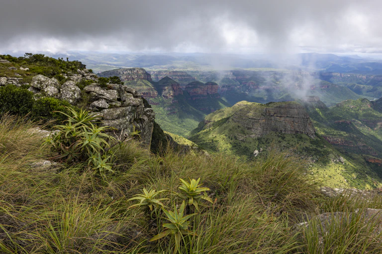 Mountain range landscape, with light mist over the top