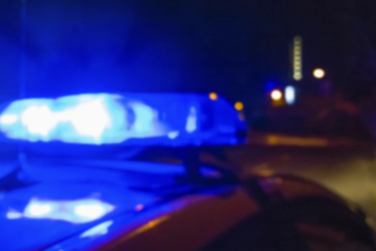 blue police car light at night