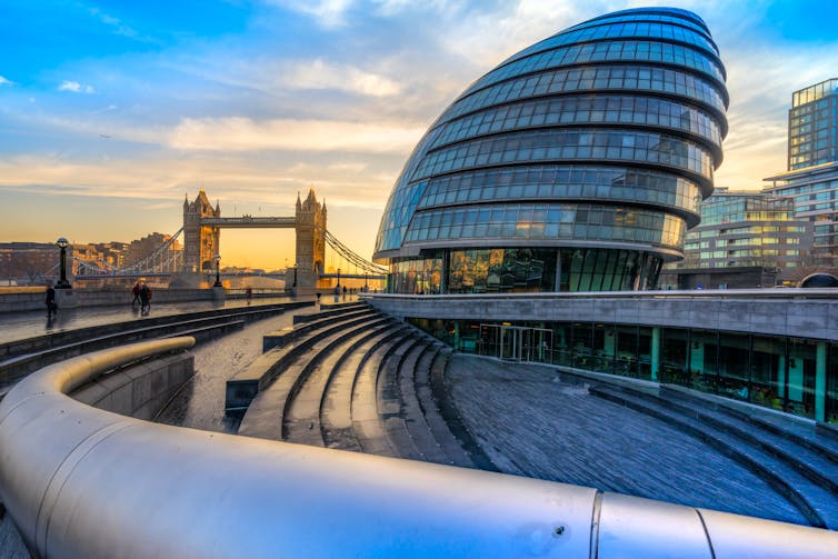 The Tower of London in background with City Hall in front.