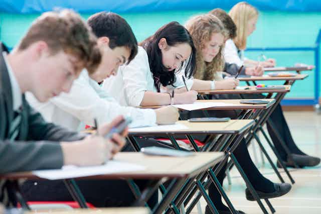 Teenagers taking exam