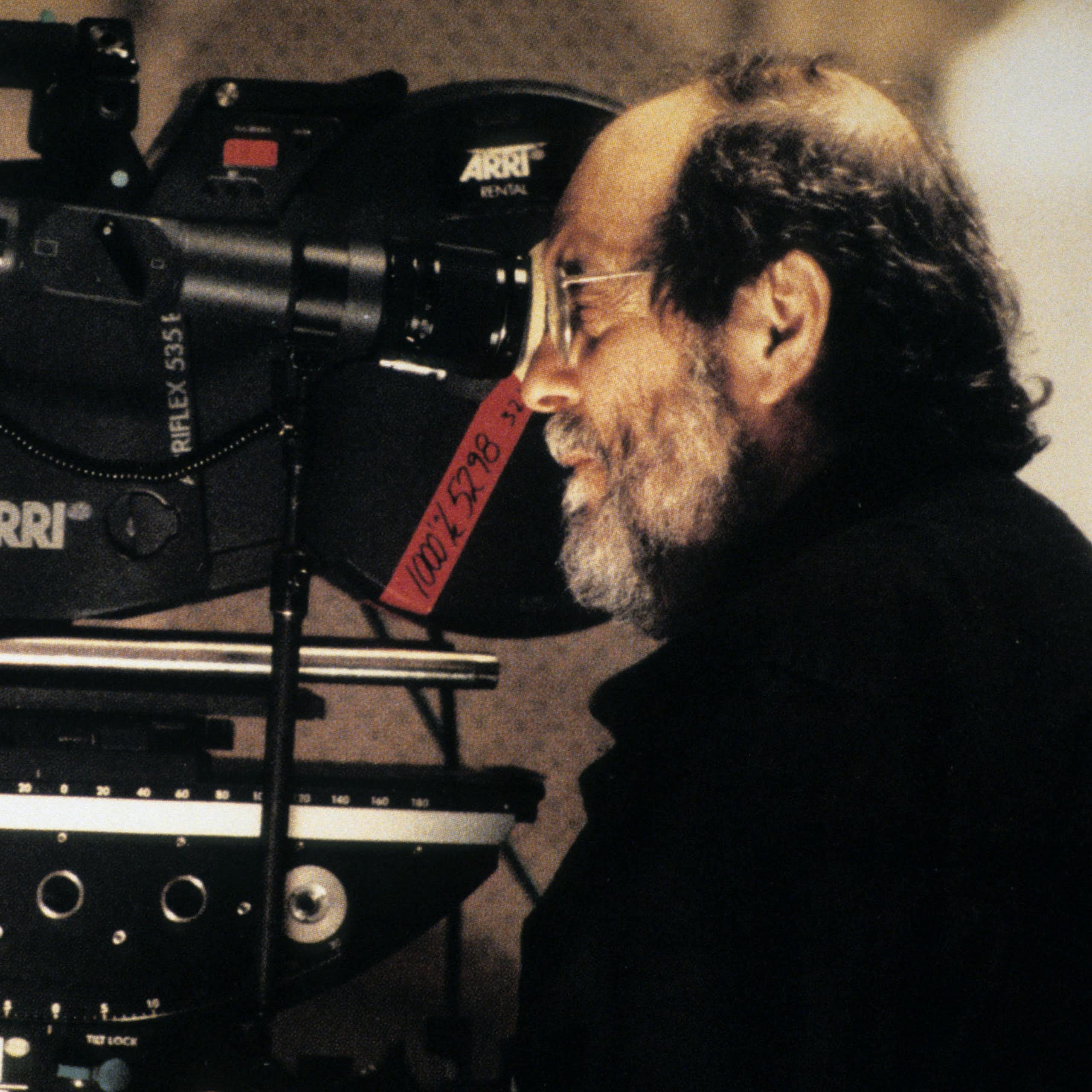 Stanley Kubrick looking into a camera.
