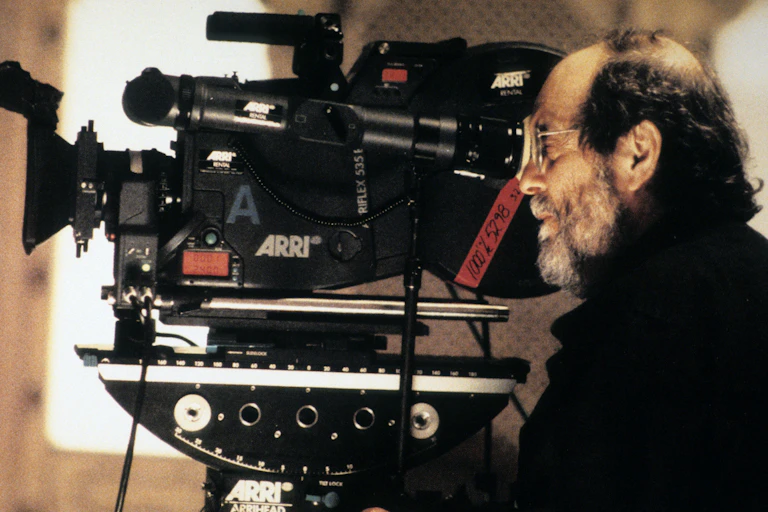 Stanley Kubrick looking into a camera.