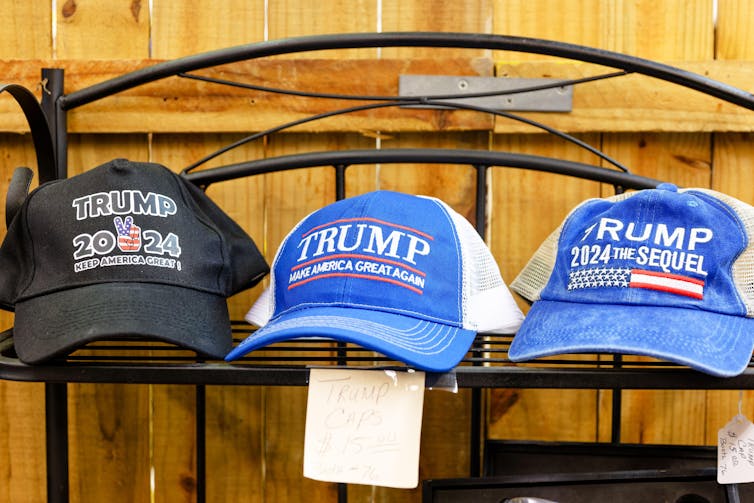 Three caps next to each other with Trump logo.