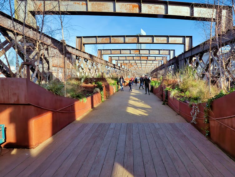 Planters on a bridge.