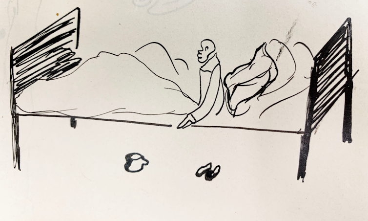 A drawing of a person in bed.