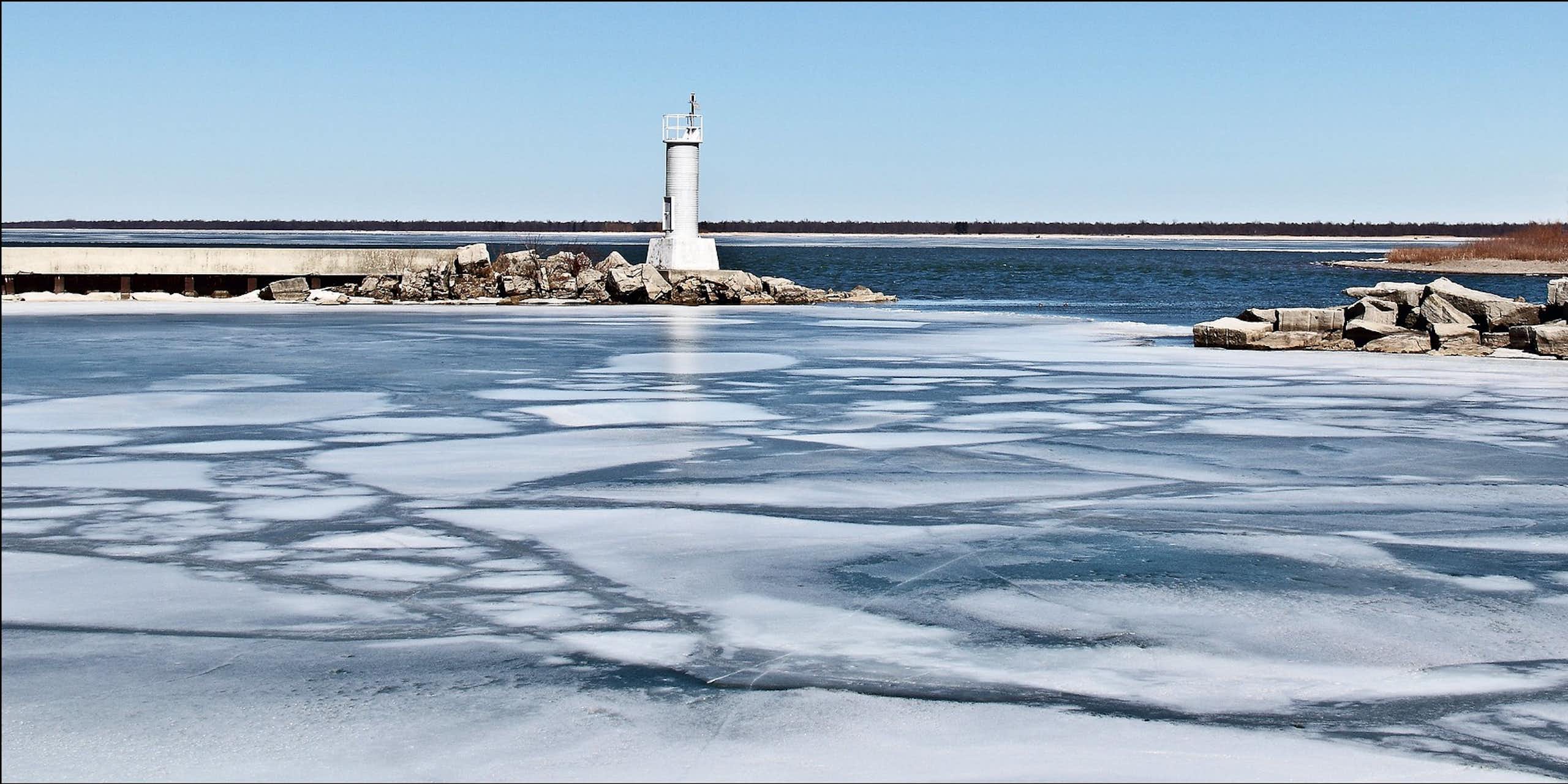 Thin ice near a lighthouse.
