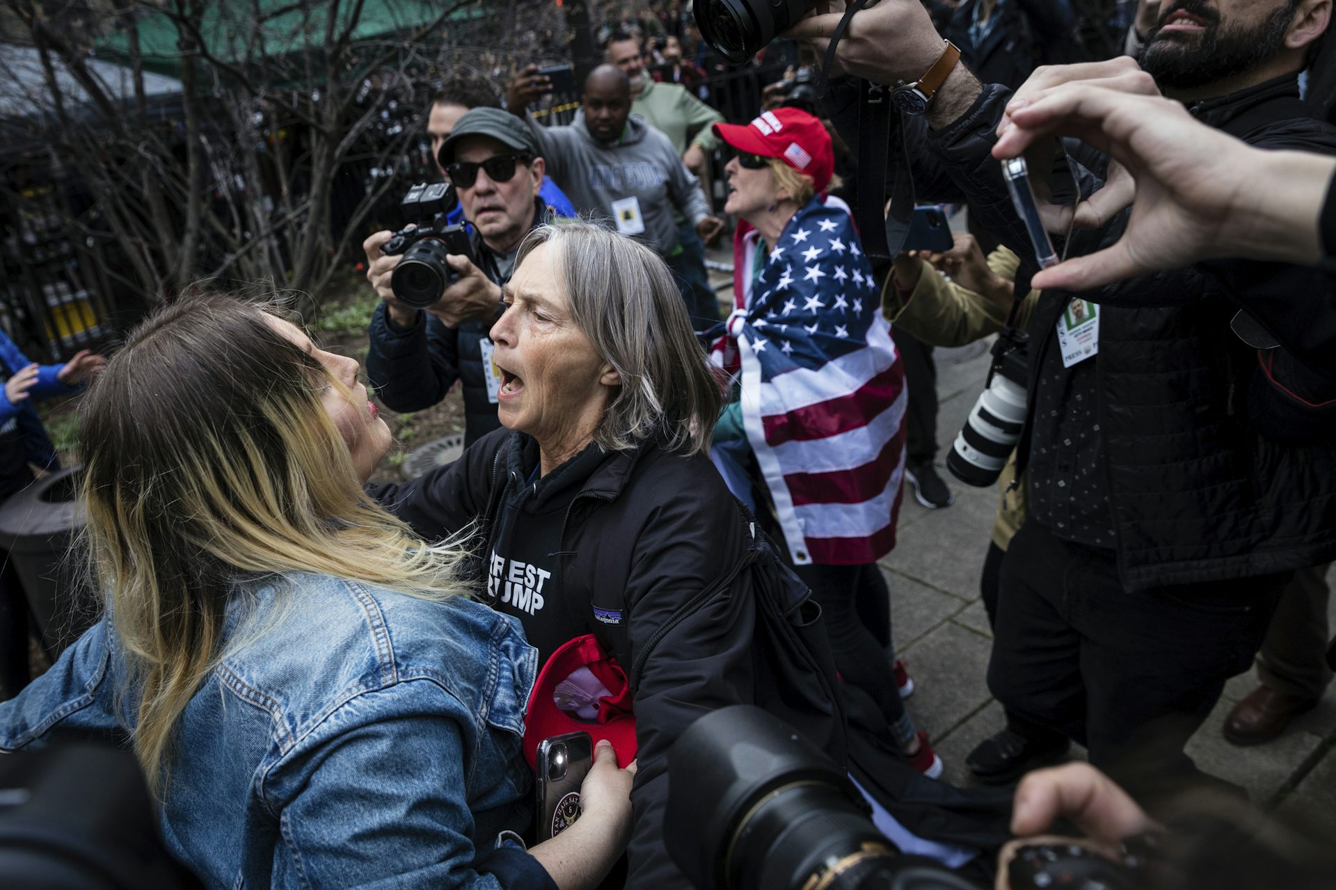 Pro-Trump protesters arguing with counter-protesters.