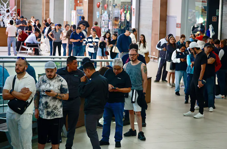 Mexicans waiting in line to vote.