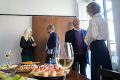 Work colleagues at a social function