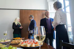 Work colleagues at a social function