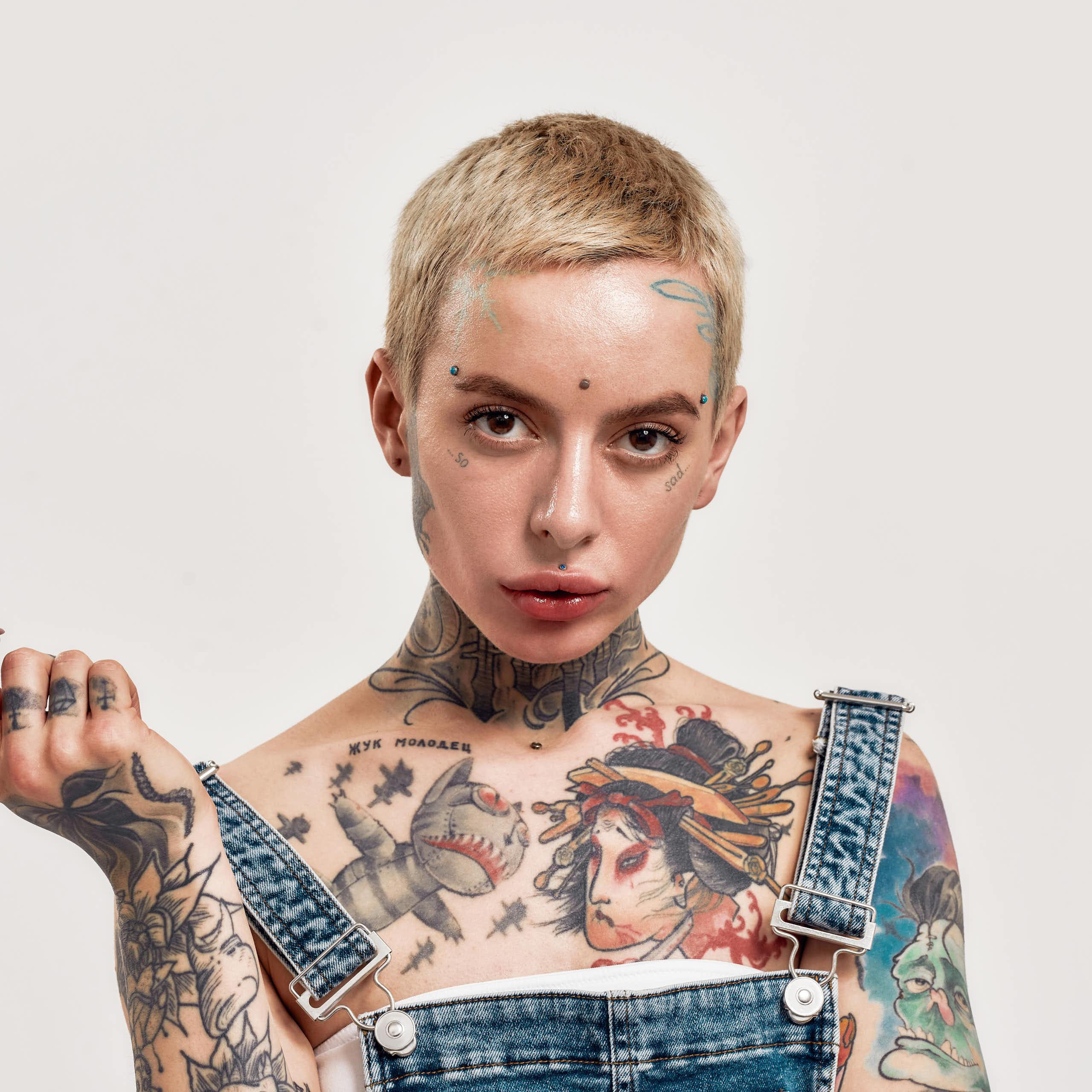 Woman with multiple tattoos