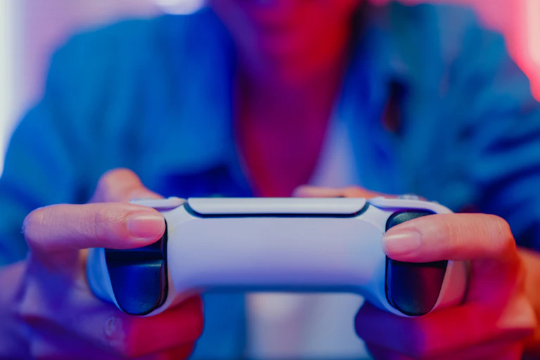 A person is using a video game controller.