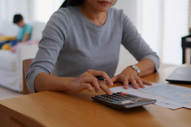 Woman with calculator
