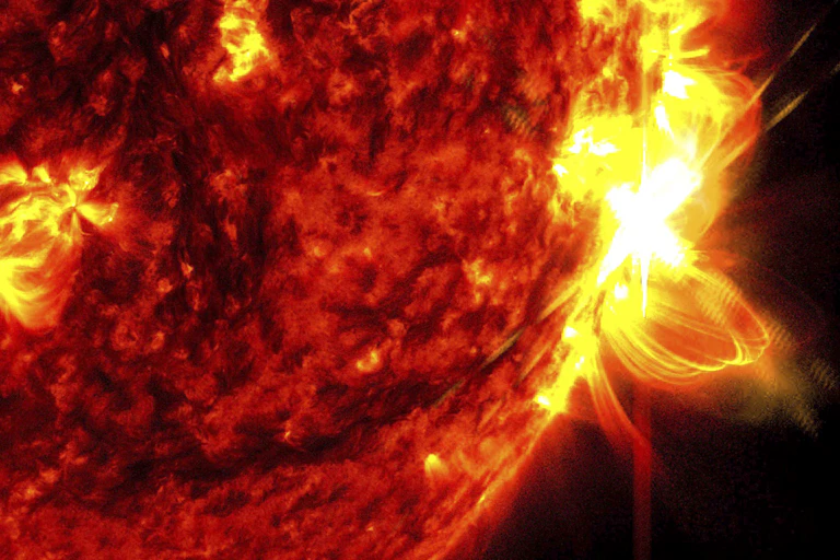 The Sun's surface, with bright rays coming off it.