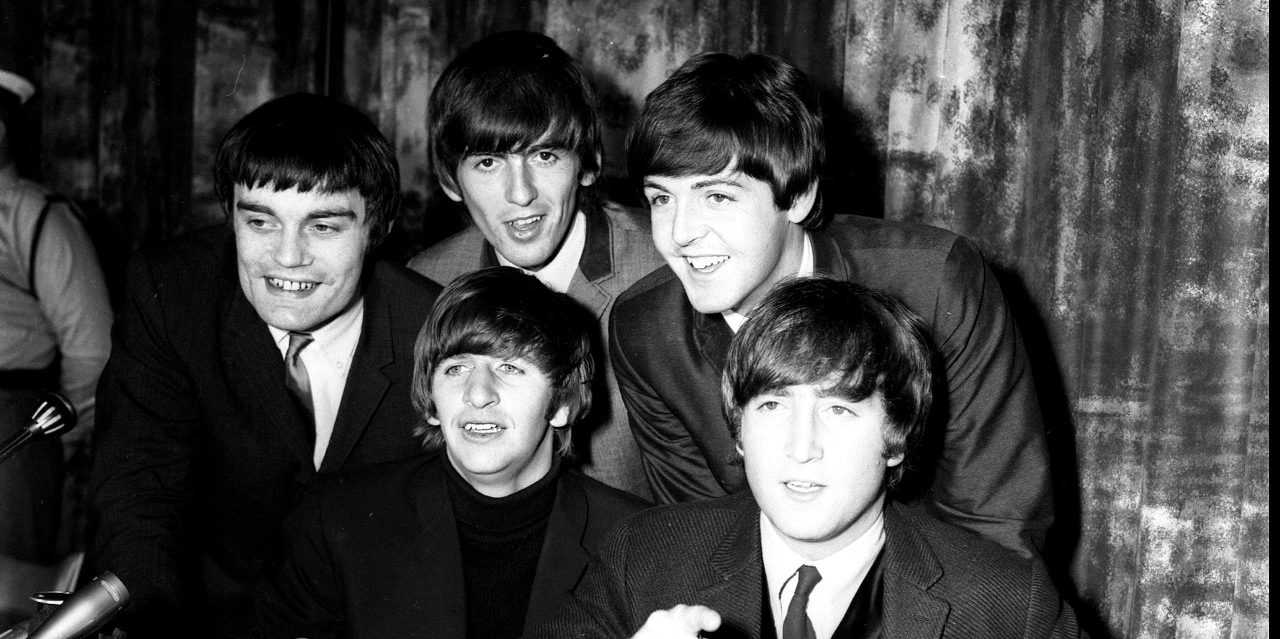 The five Beatles. 