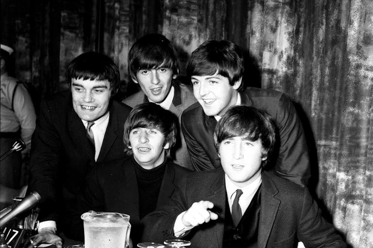 The five Beatles.