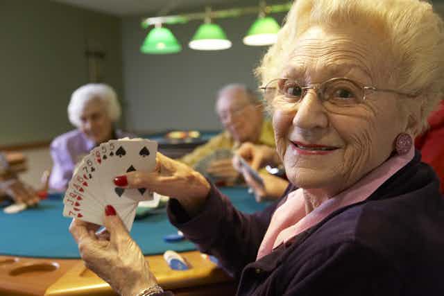 Older adults playing bridge