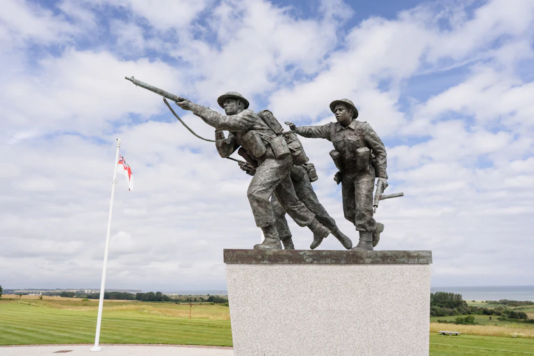 A war memorial against a cloudy sky.