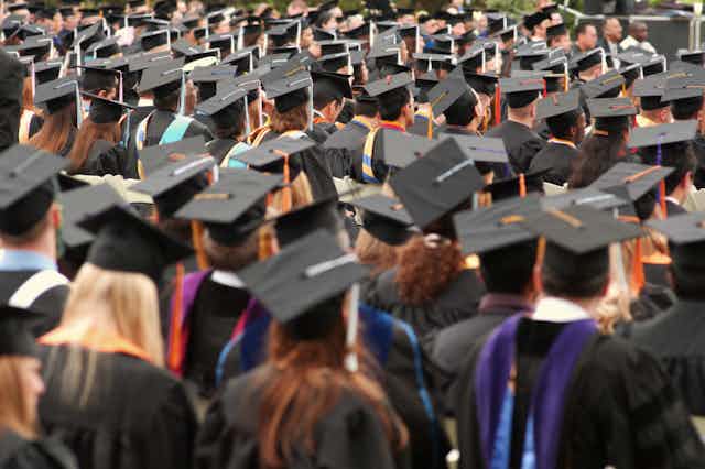 Students in mortar boards at a graduation ceremony