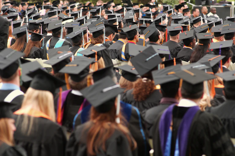 Students in mortar boards at a graduation ceremony