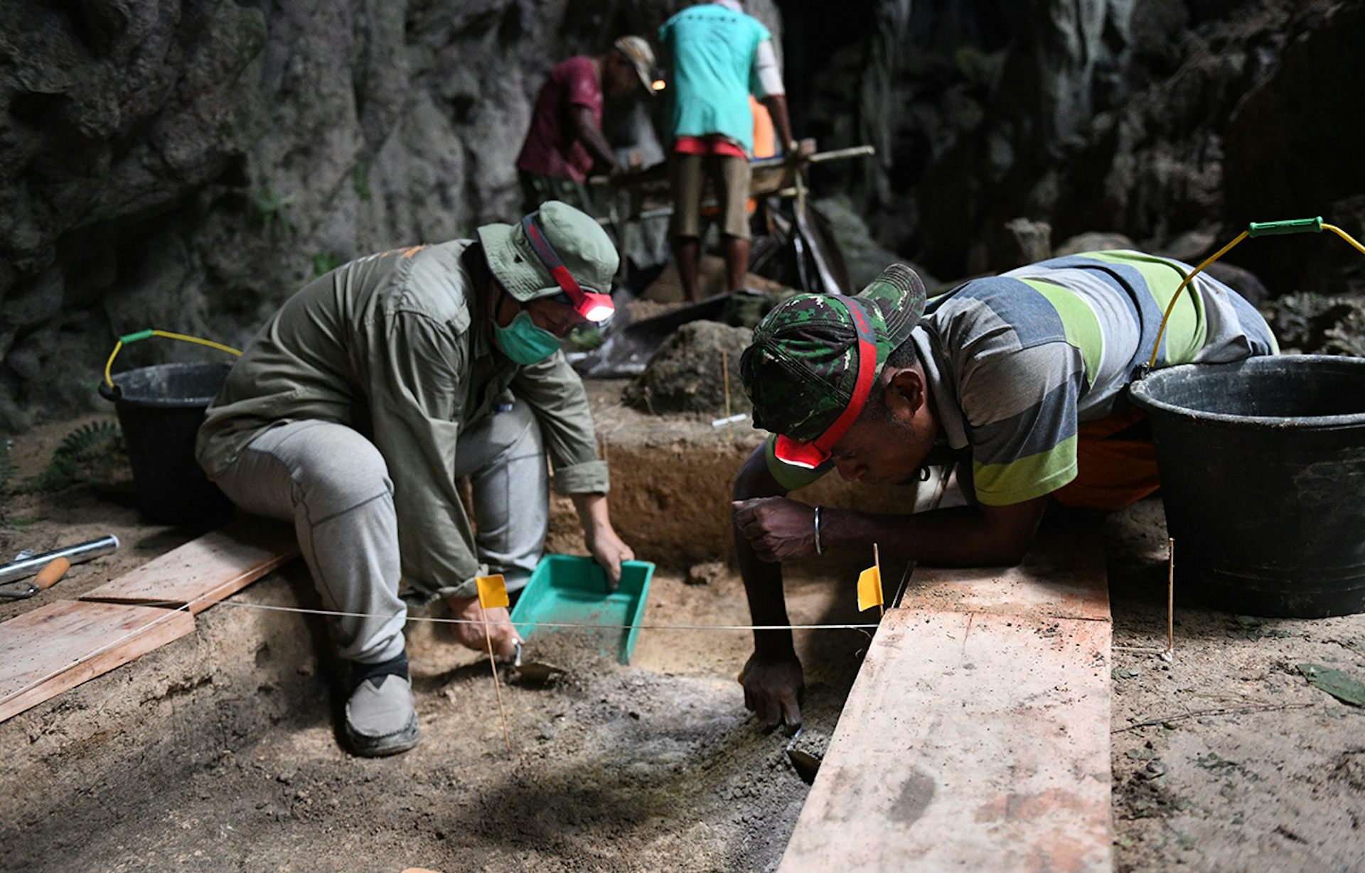 Archaeologists at an excavation site.