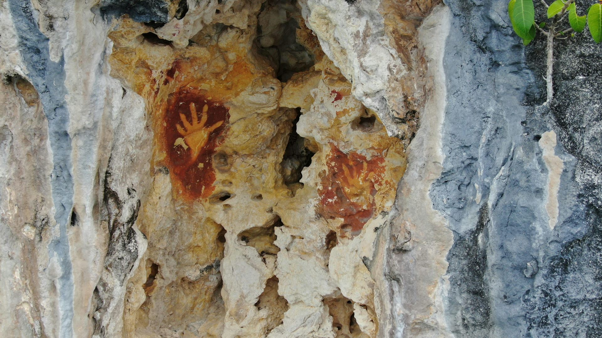 Hand stencils of unknown age from the Raja Ampat Islands.