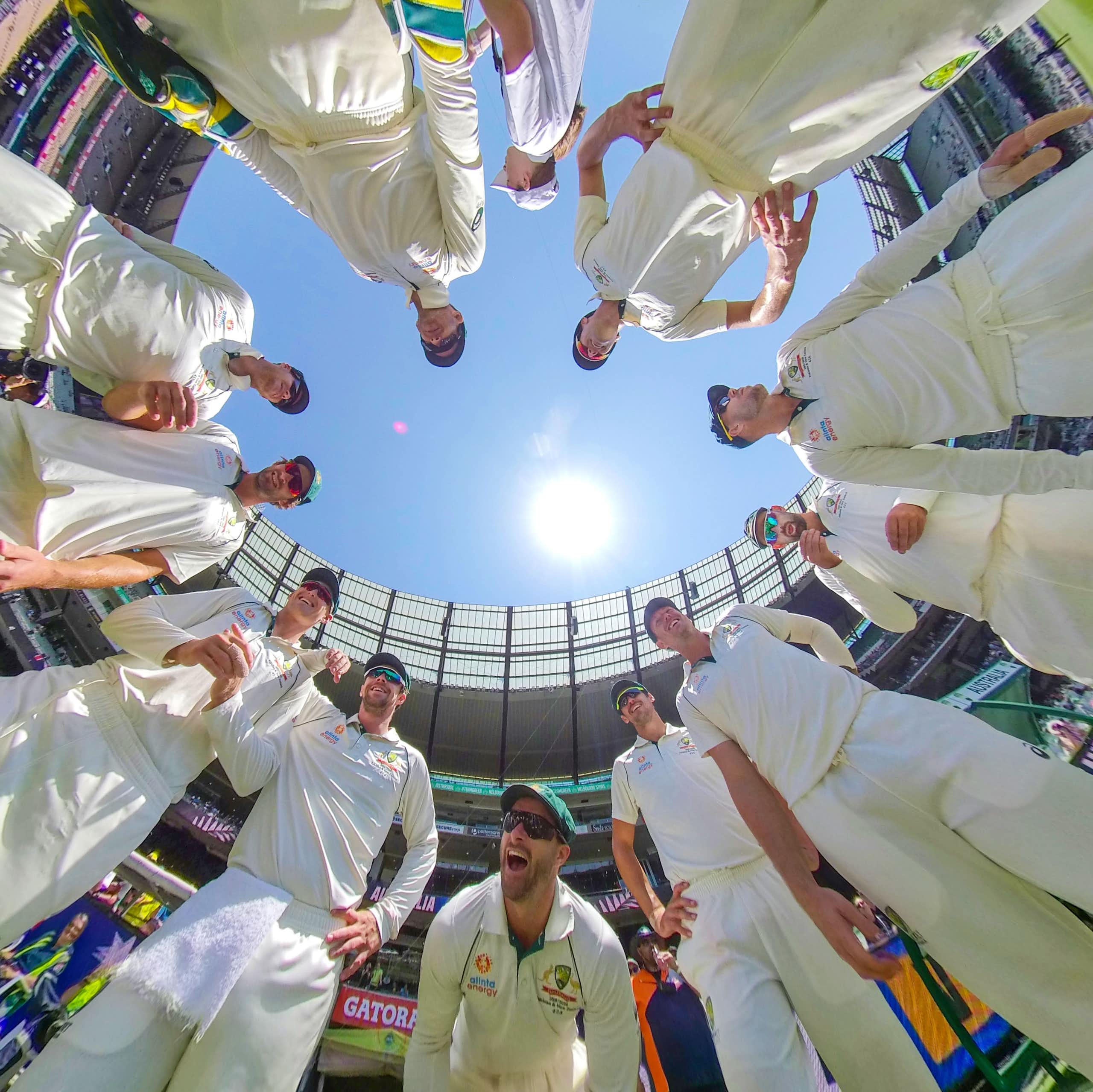 Tim Paine, captain of Australia speaks to his team in a huddle as Matthew Wade of Australia and his teammates look on during day 4 of the Boxing Day Test match between Australia and New Zealand at the MCG in Melbourne, Sunday, December 29, 2019.