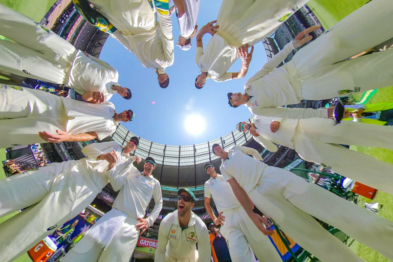 Tim Paine, captain of Australia speaks to his team in a huddle as Matthew Wade of Australia and his teammates look on during day 4 of the Boxing Day Test match between Australia and New Zealand at the MCG in Melbourne, Sunday, December 29, 2019.