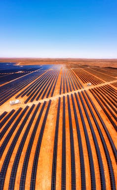 Vast array of solar panels in arid landscape in Australia