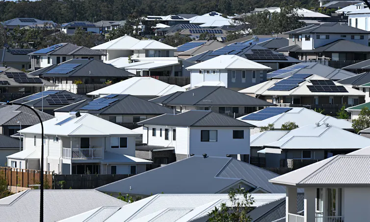 Suburban rooftops seen from a distance