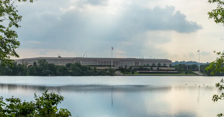 A view across a lake of the Pentagon building in Washington DC.