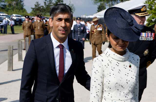 Rishi Sunak and his wife at a D-Day event.