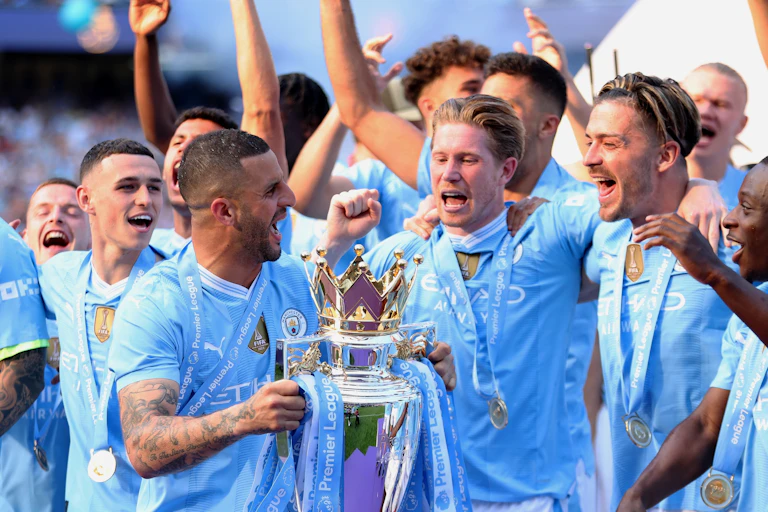 Manchester City players celebrate.