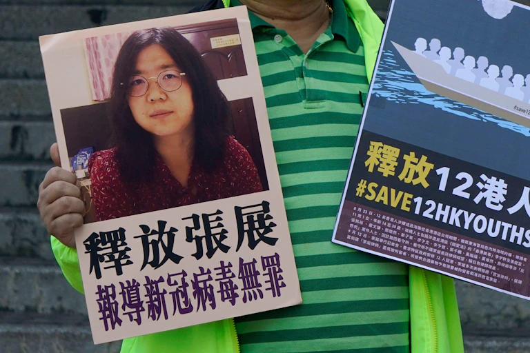 Posters highlighting Zhang Zhan's imprisonment.