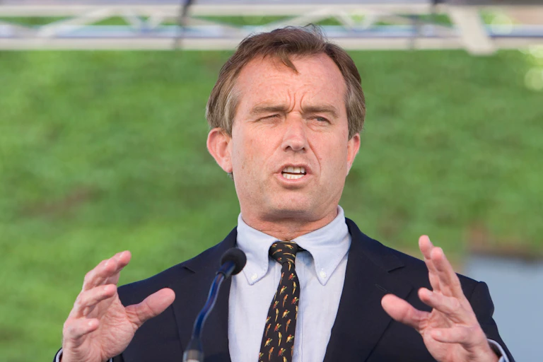 Robert F Kennedy at a podium.