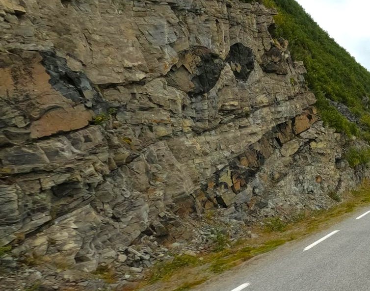 Younger dykes intruding into older rocks