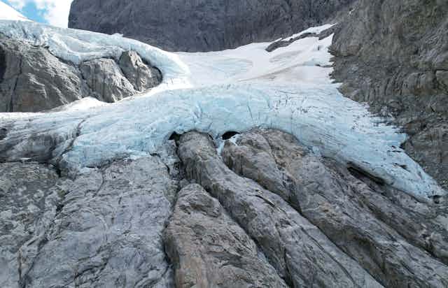 The Donne Glacier flowing over rocks